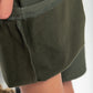 Faux leather pants, olive.